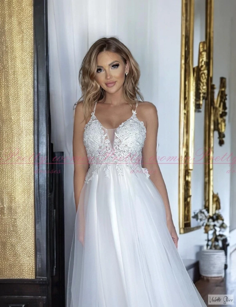 Tylové bílé šaty Zefir 34