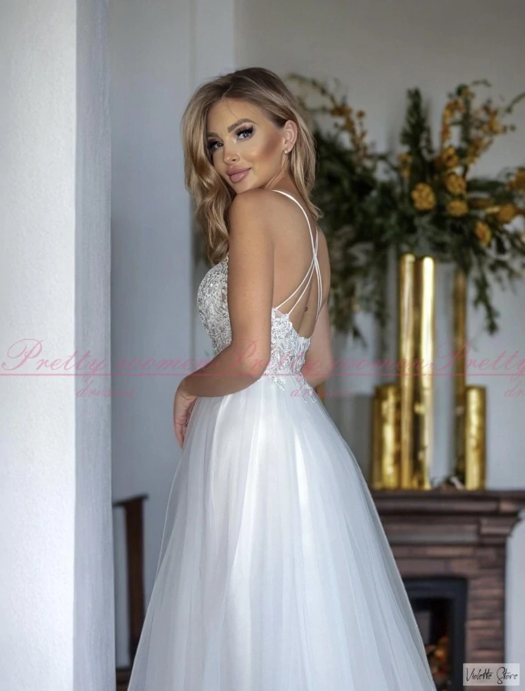 Tylové bílé šaty Zefir 34